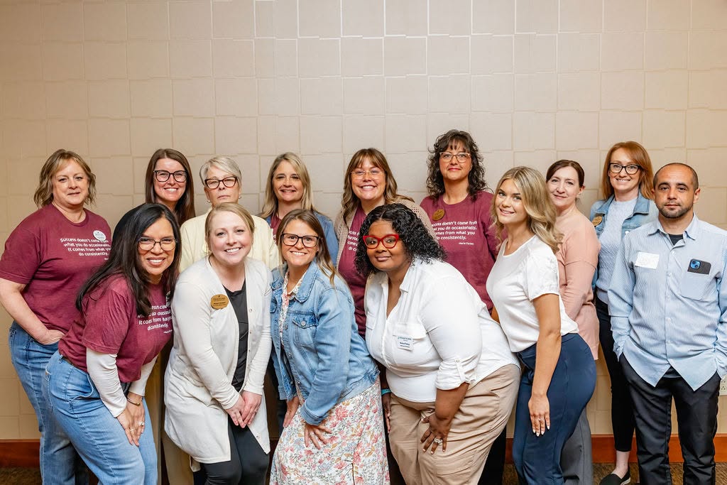 Group of Traditions employees during the annual company meeting
